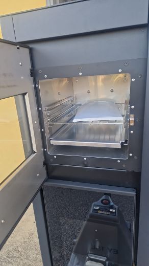 Immagine di Stufa Pellet VENTILATO  Canalizzabile Con Forno 8,5 Kw Eva Calor Biscotto CON AMMACCATURA PER TRASPORTO